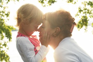 Mom Is Looking Lovingly At Her Daughter